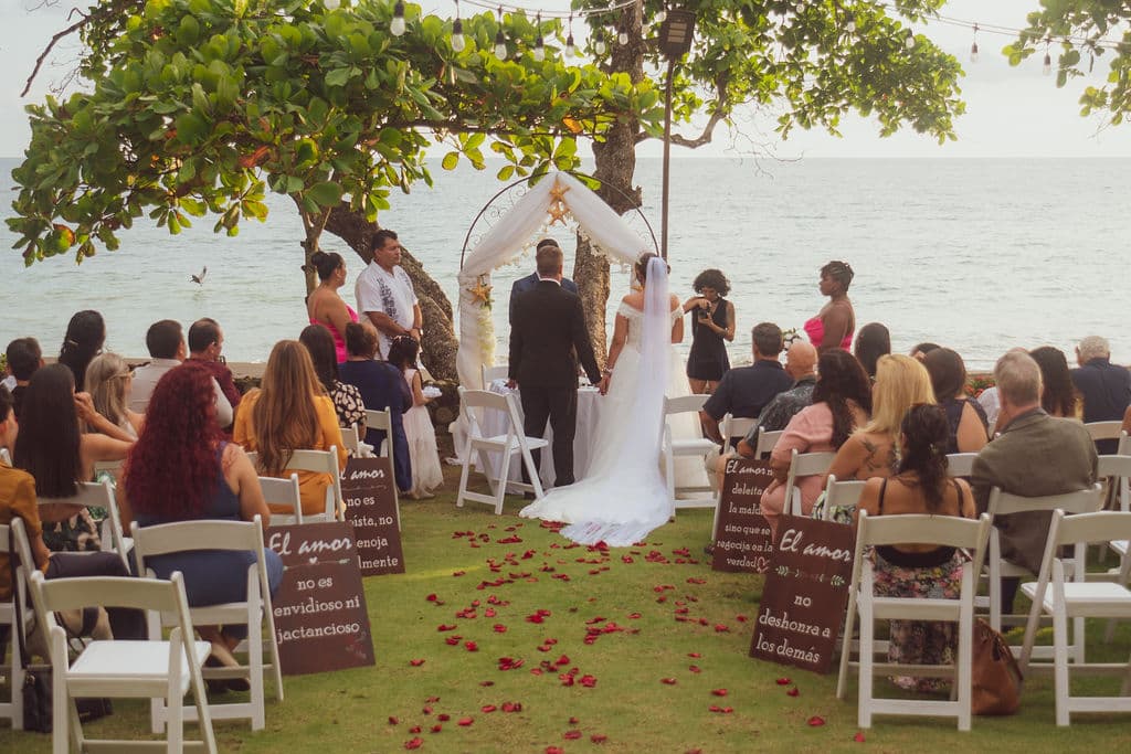 Couple celebrating an oceanfront wedding