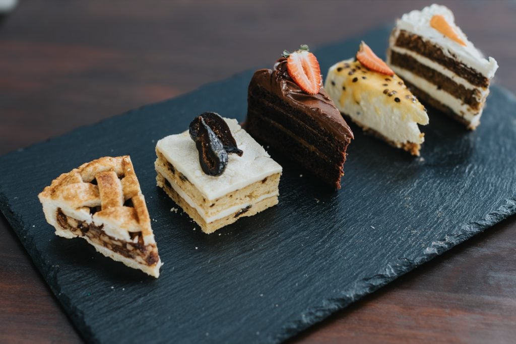 Slices of pastry on a slate board