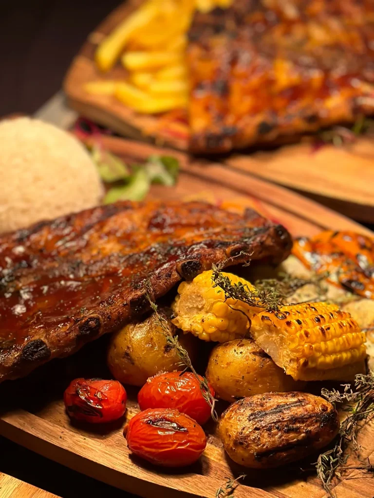 Grilled ribs with corn and potatoes