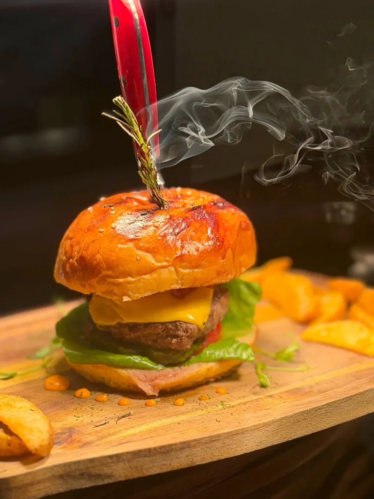 Grilled burger served on a wooden board