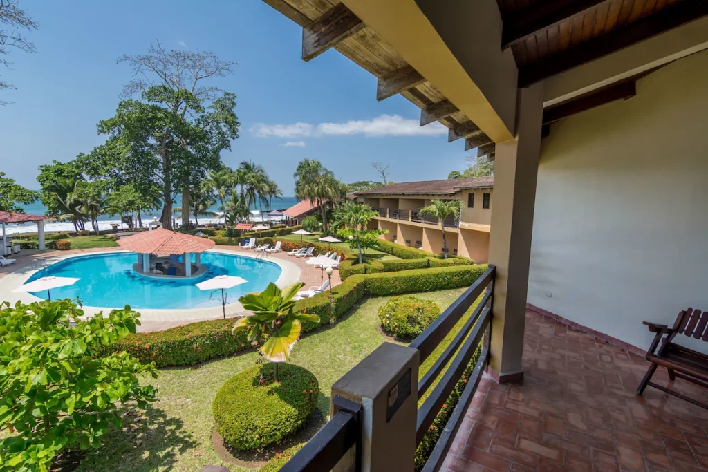The pool and gardens seen from the room balcony